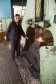 Ловким движением кузнец устанавливает заготовку в штамповочную форму