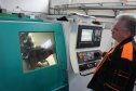 На фото: работа токарного двухшпиндельного обрабатывающего центра для обработки деталей золотниковой группы
